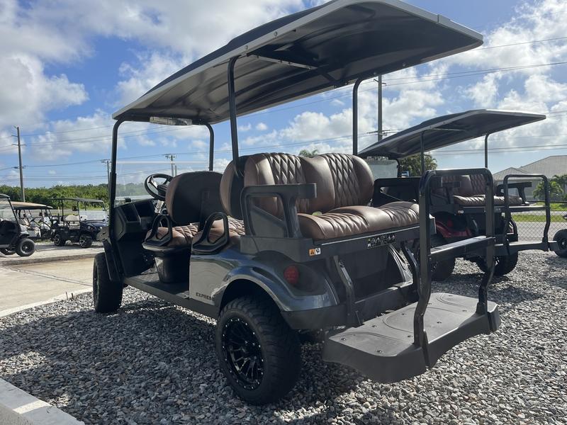 2025 E-Z-Go Express 6 Gas Inferno Red 6-Passenger Street-Legal Golf Cart Phoenix Az (Side View) 4 Rear View Of 2025 E-Z-Go Express 6 Gas Inferno Red In Phoenix, Arizona.