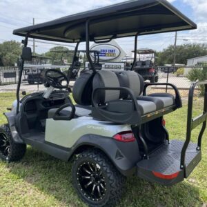 Rear flip-seat with cargo platform