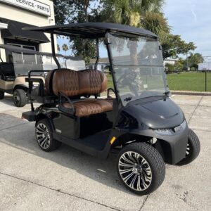 Side profile of the 2026 E-Z-GO Freedom RXV ELiTE Lithium Black golf cart in Dallas Texas