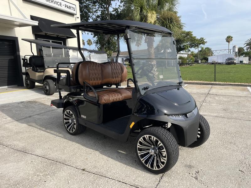 2026 E-Z-Go Freedom Rxv Elite Lithium Black 4-Passenger Electric Golf Cart In Dallas Tx 1 Side Profile Of The 2026 E-Z-Go Freedom Rxv Elite Lithium Black Golf Cart In Dallas Texas