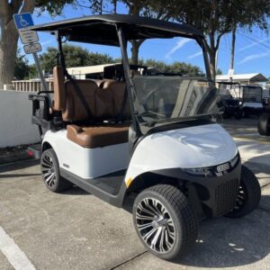 Side profile of the 2026 E-Z-GO Freedom RXV ELiTE Lithium Bright White golf cart in Charleston SC